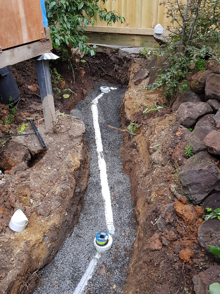 Drainage pipes being covered