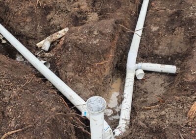 Excavation with pipe network
