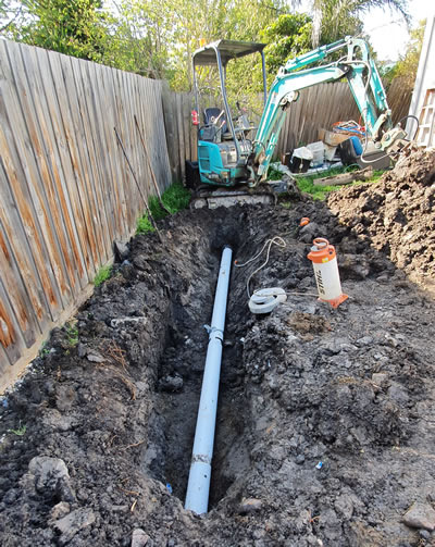 Excavating Trench with Digger